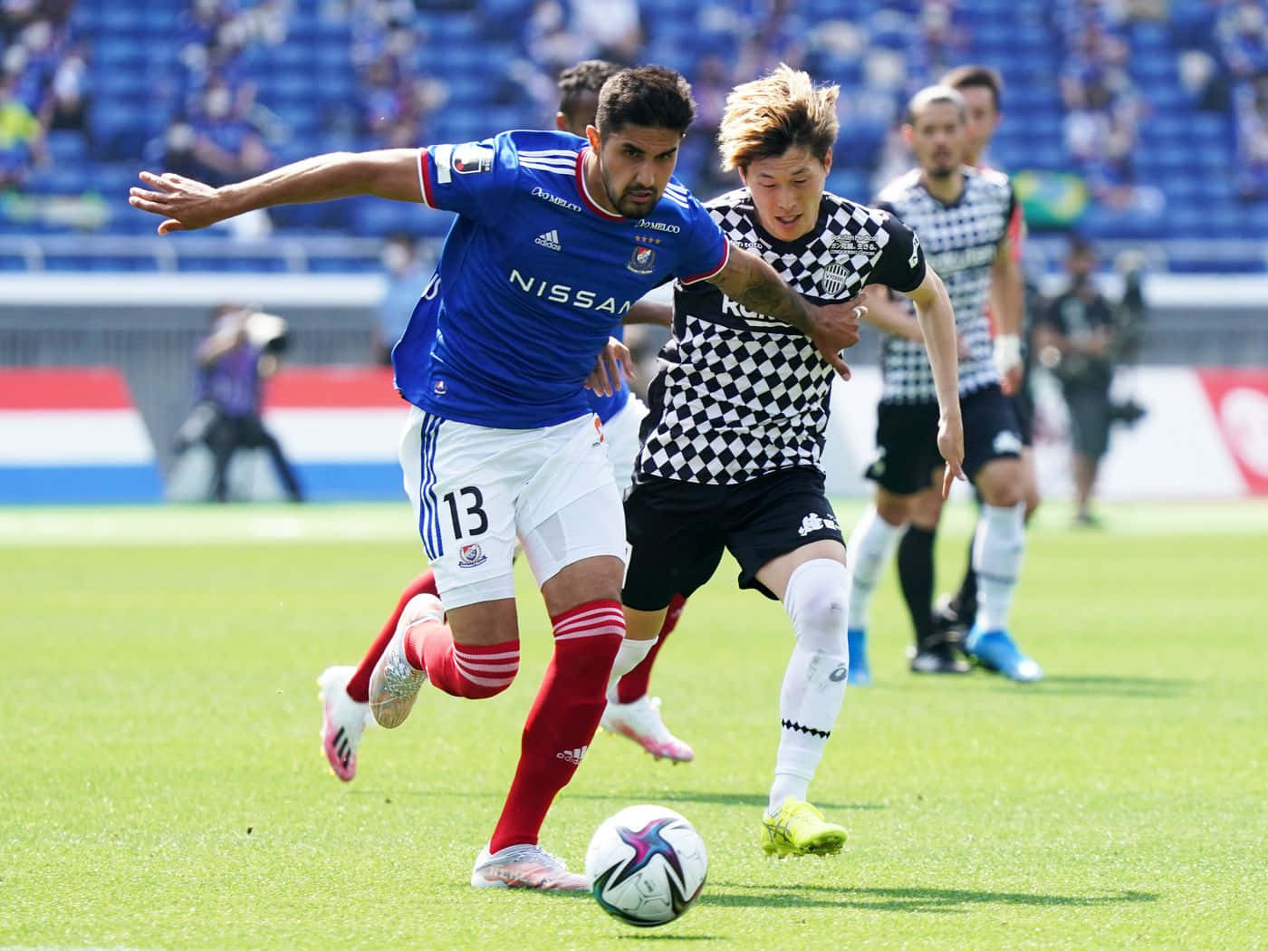 Brazilian Footballer Thiago Martins Against Kyogo Furuhashi Background