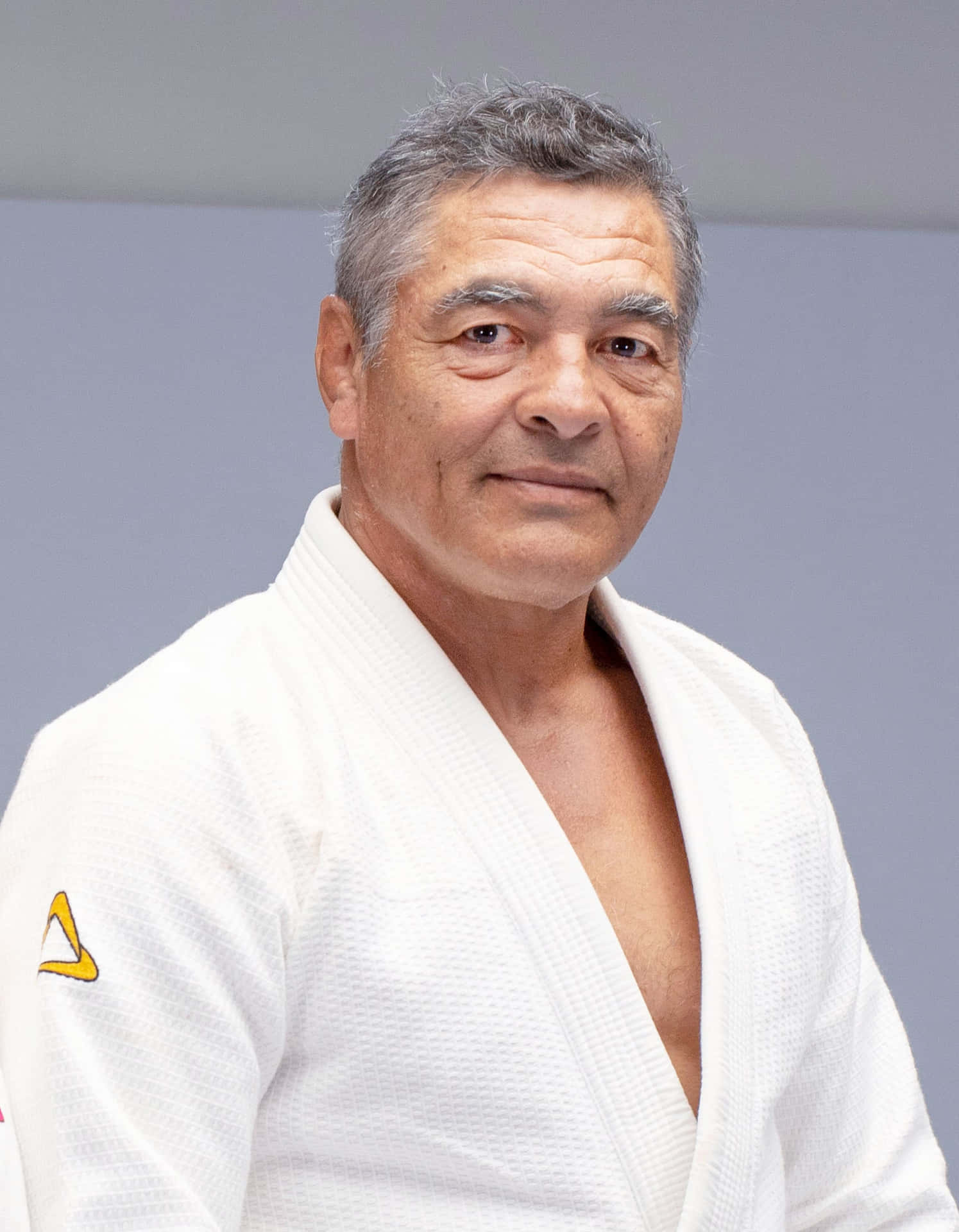 Brazilian Martial Arts Master, Rickson Gracie, In A 2021 Candid Portrait. Background