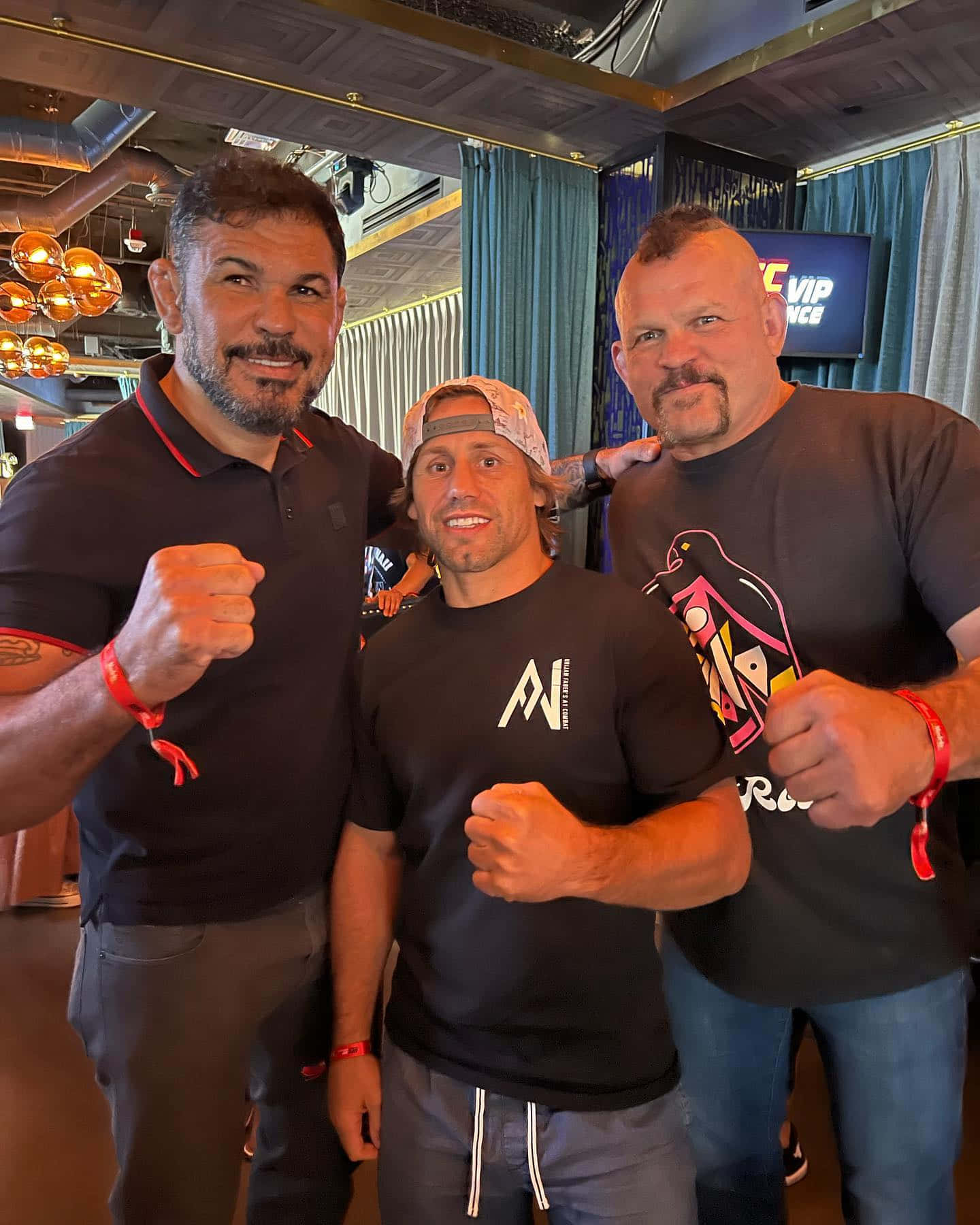 Brazilian Mixed Martial Artist Antônio Rodrigo Nogueira Posing For A Photo With Fans Background