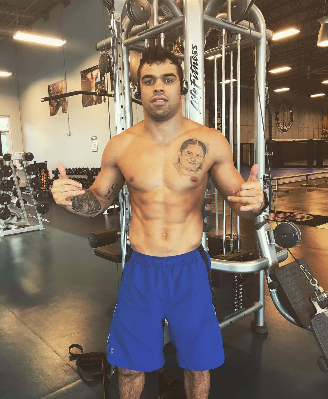 Brazilian Mixed Martial Artist Renan Barão In Gym Background