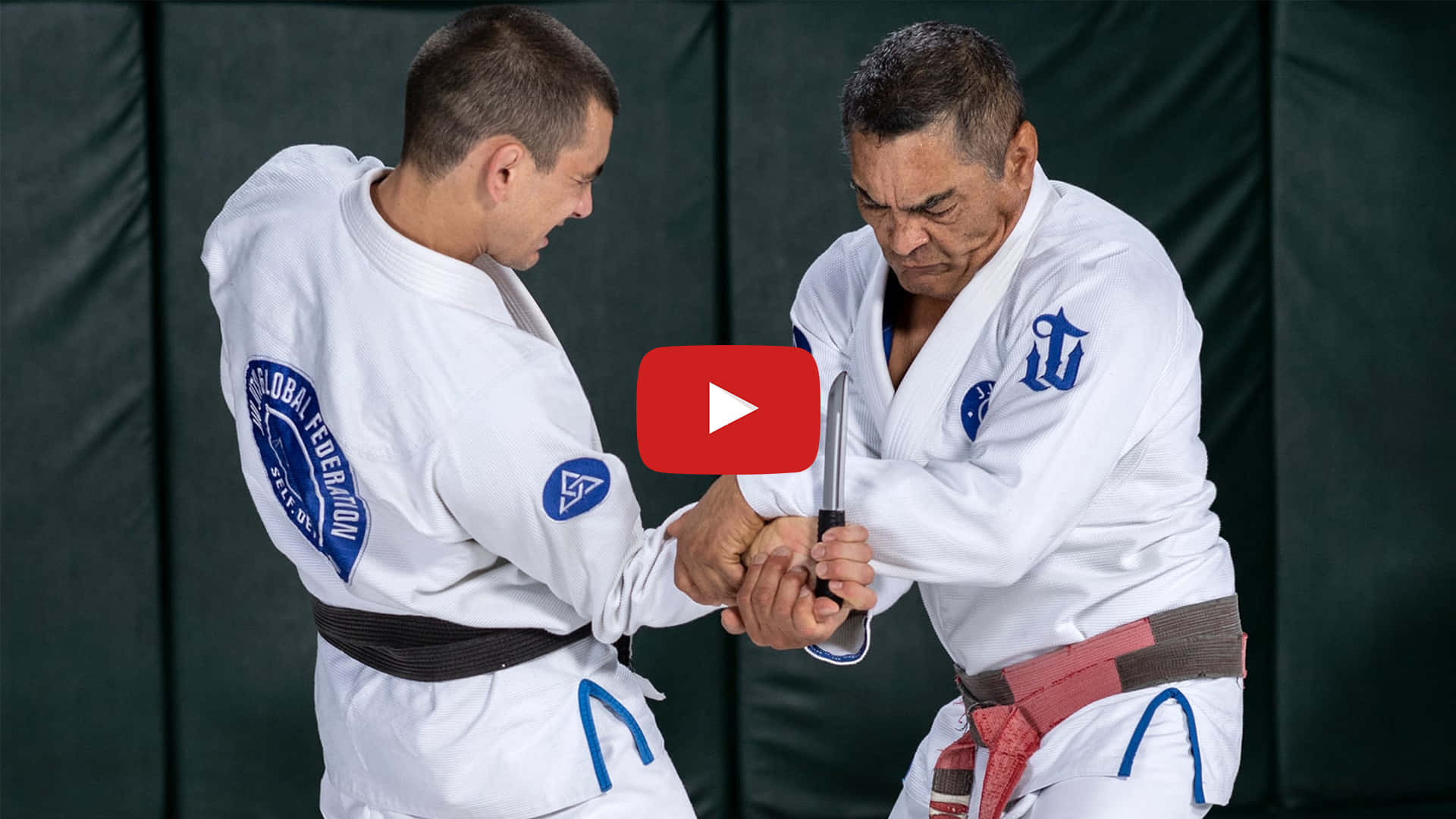 Brazilian Mixed Martial Artist Rickson Gracie Teaching Jiu Jutsu Background