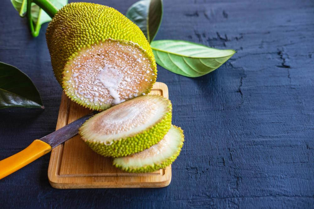 Breadfruit On A Chopping Board Background