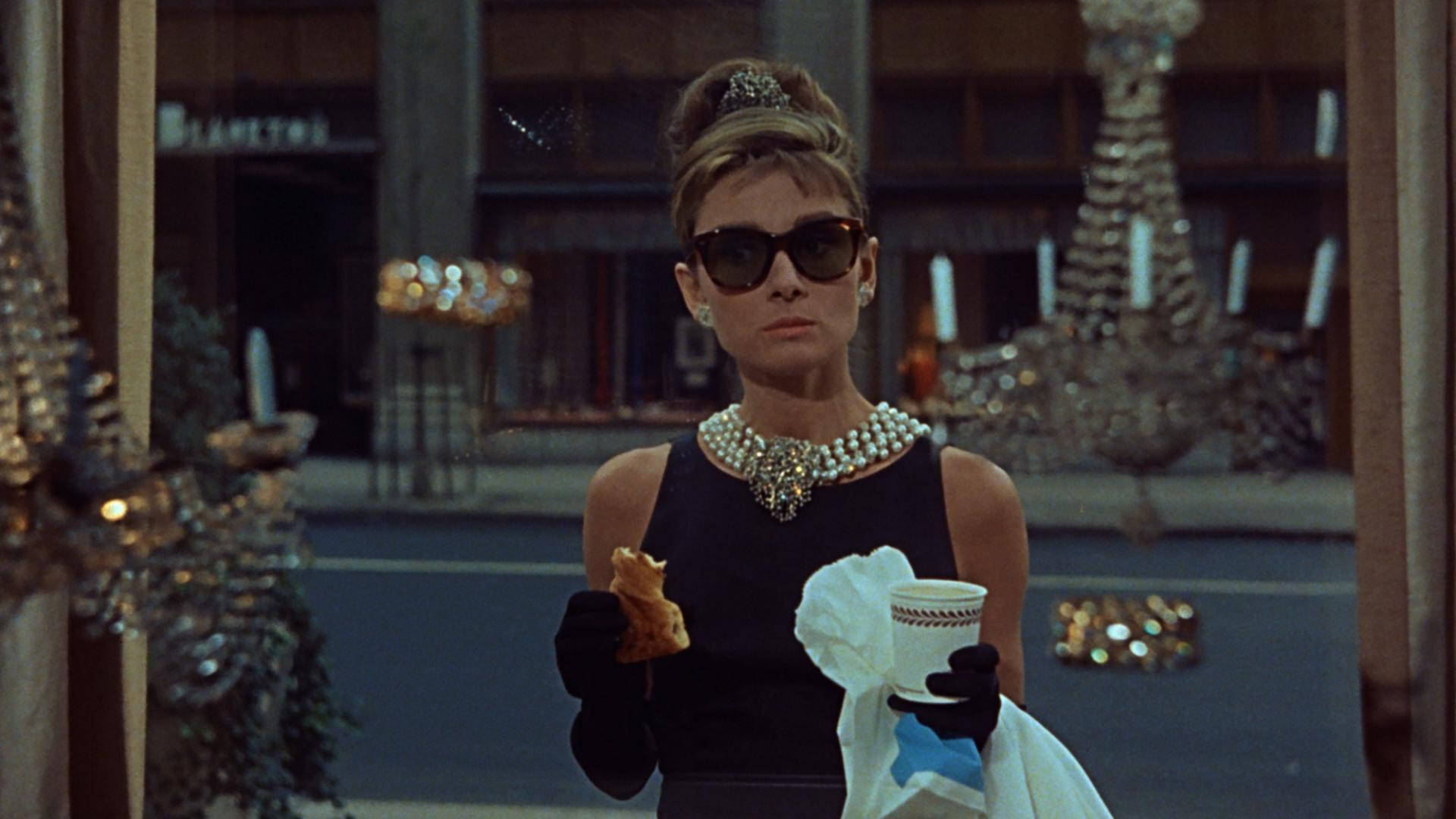 Breakfast At Tiffany's Holding Food Background
