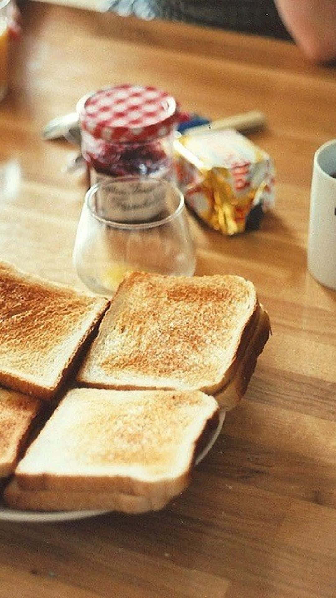 Breakfast Table With Toast Jam Butter Background