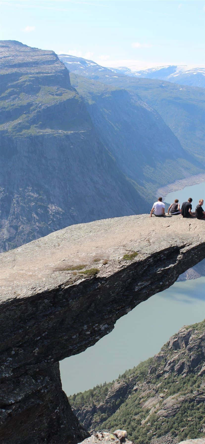 Breath-taking View From The Edge Of Trolltunga, Norway Background