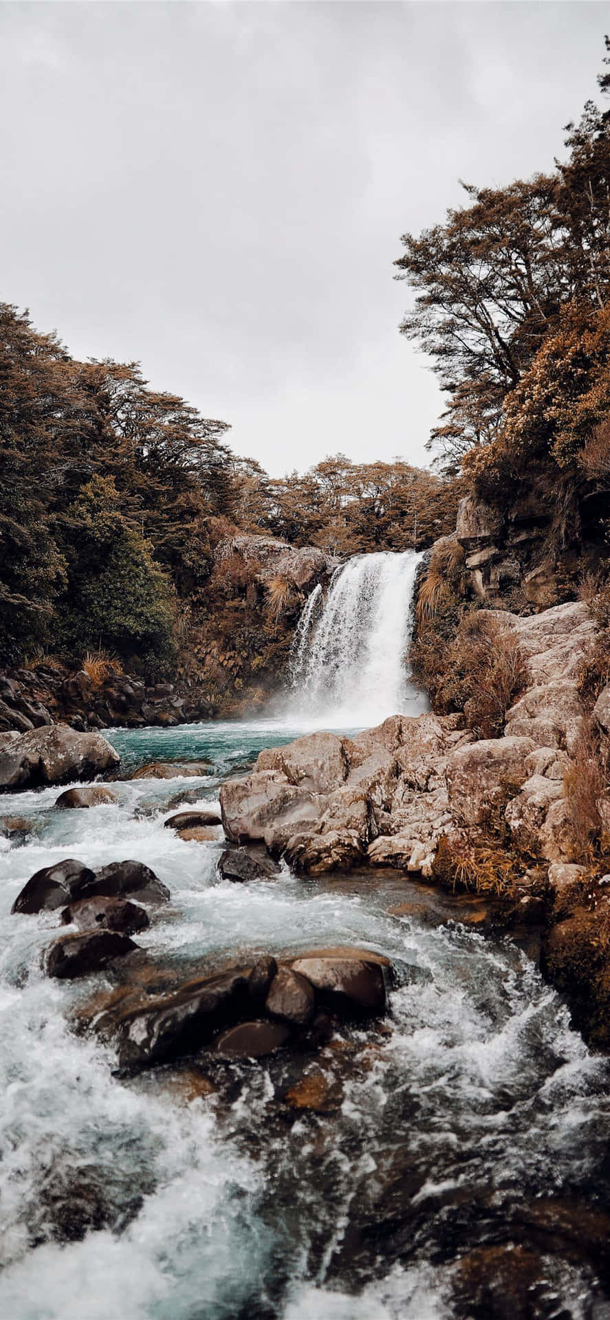 Breathe In The Beauty Of Nature With This Majestic Iphone Waterfall Background