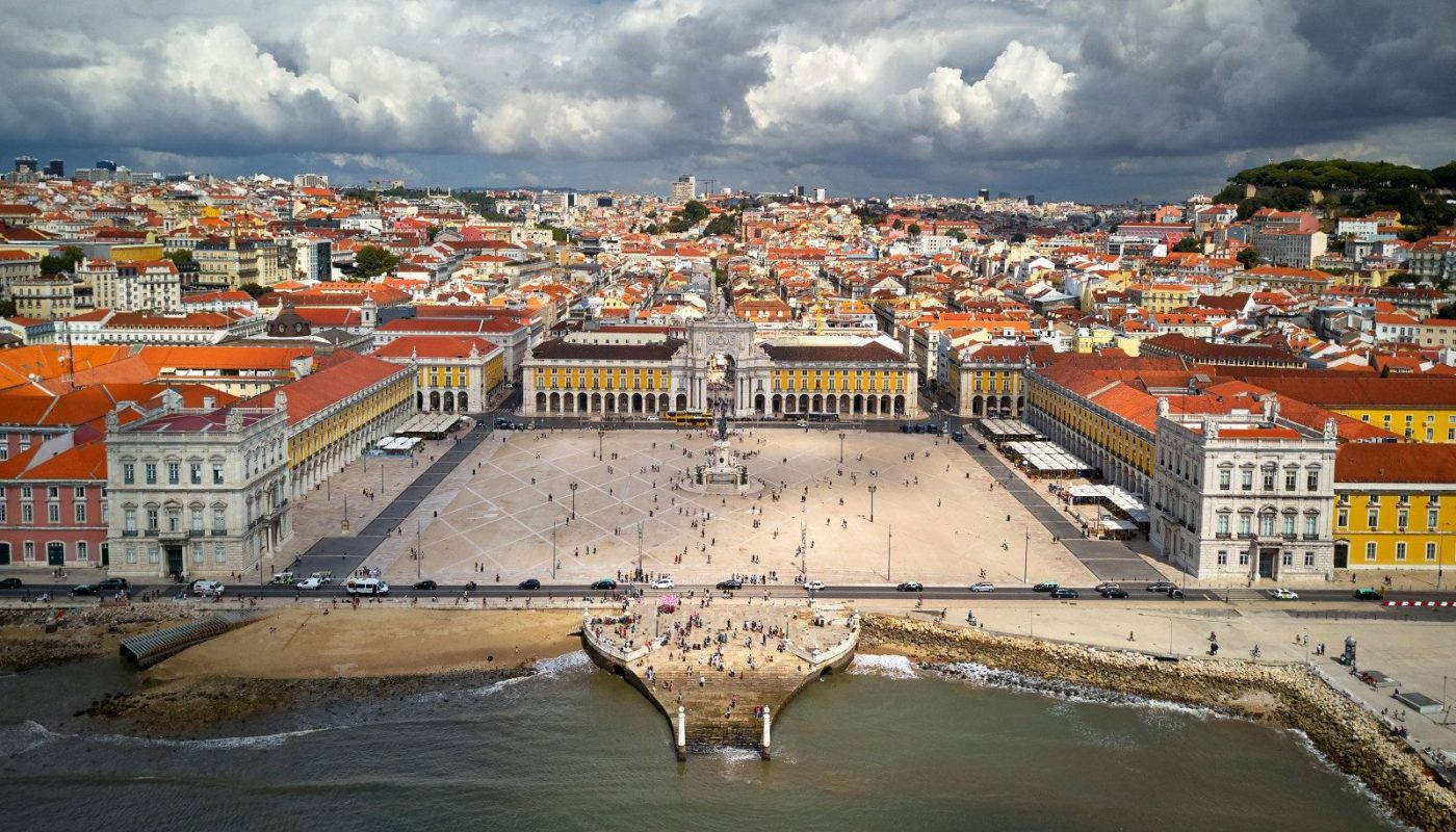 Breathtaking Aerial View Of Praca Do Comercio, Lisbon Background