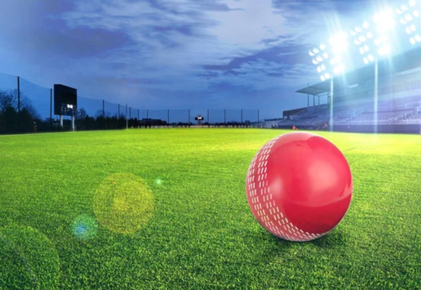 Breathtaking Cricket Ground Under Dazzling Lights Background