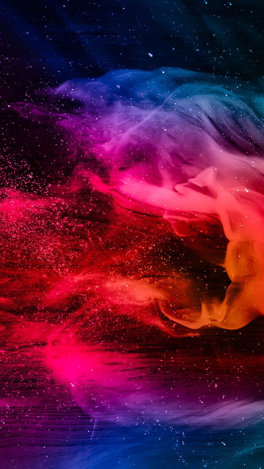 Breathtaking Display Of Bursts Of Colorful Smoke Background