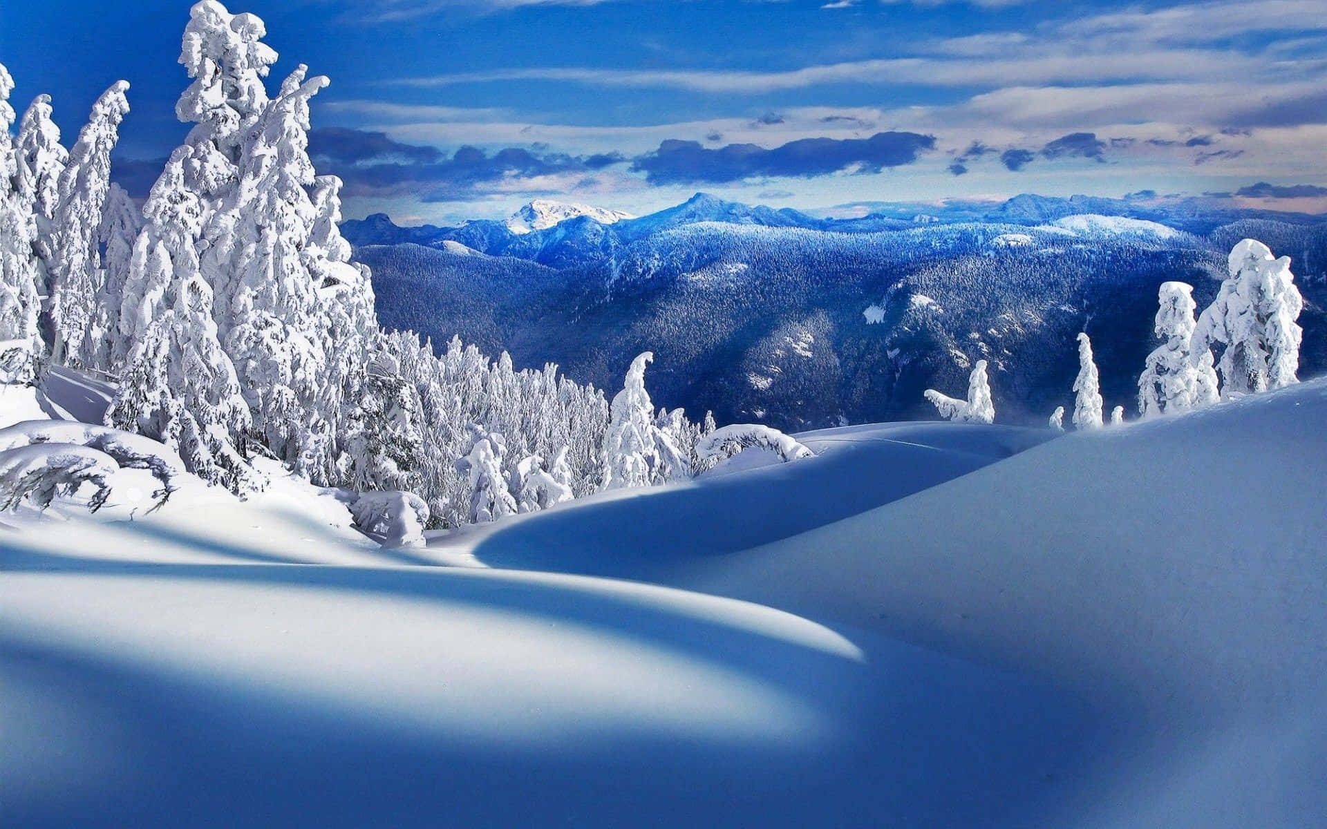 Breathtaking Mountain Scene Of Dazzling Blue Skies And Rocky Terrain. Background