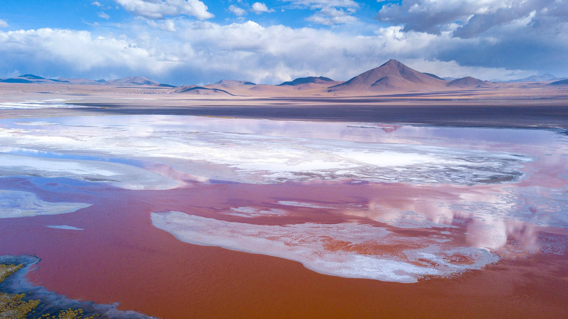 Breathtaking Red Lagoon In South America Background