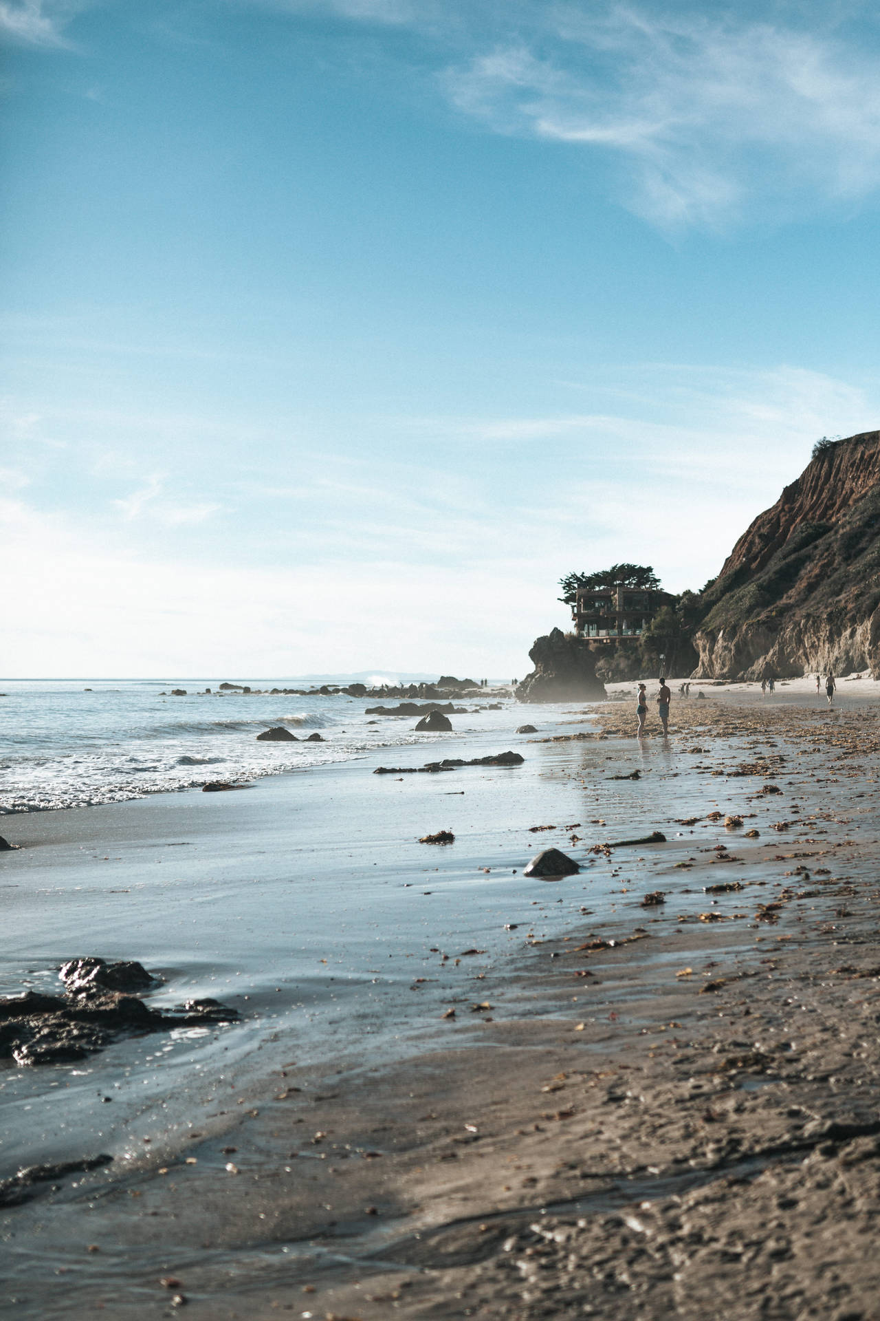 Breathtaking Shoreline Of Malibu Beach Background