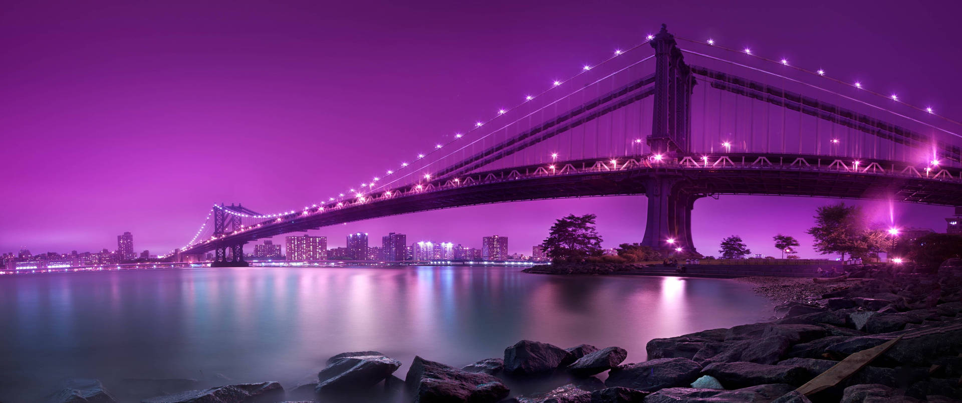 Breathtaking Ultra Wide 4k View Of A Purple Illuminated Bridge Background