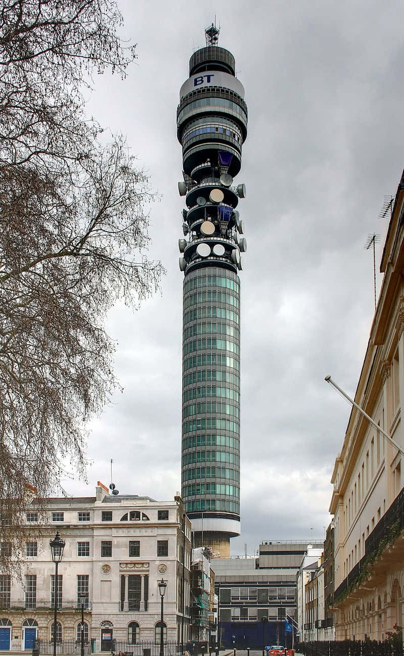 Breathtaking View Of The Iconic Bt Tower Enveloped In A Silver-grey Skyline Background