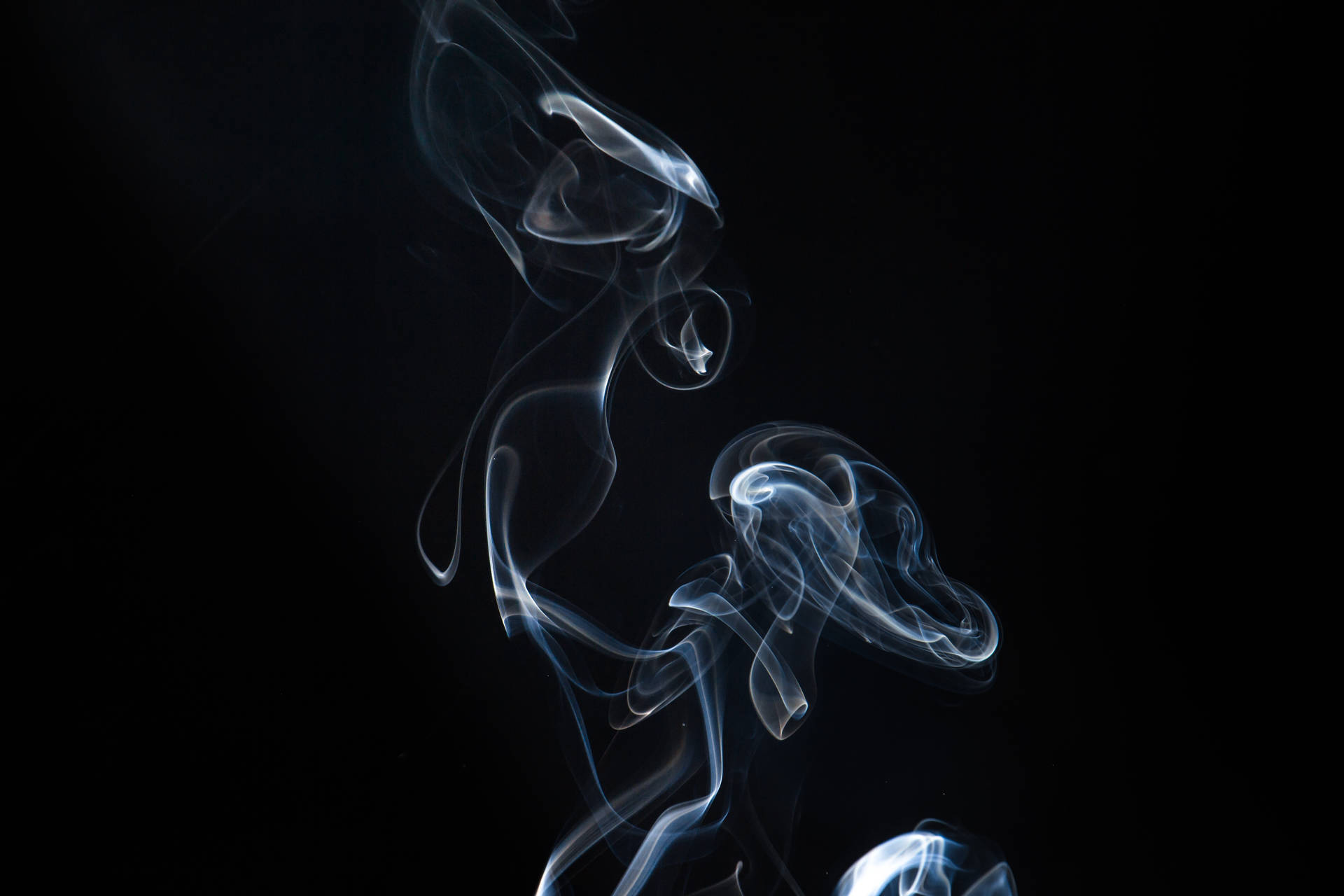 Breathtaking White Smoke Flowing Through The Air Background