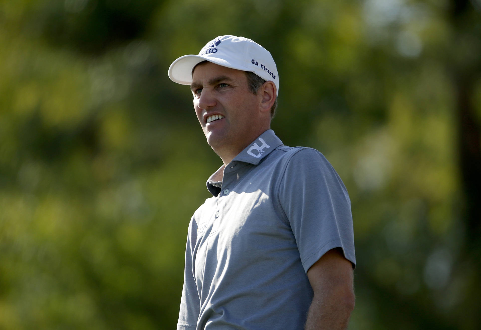 Brendon Todd In Action During A Golf Tournament Background