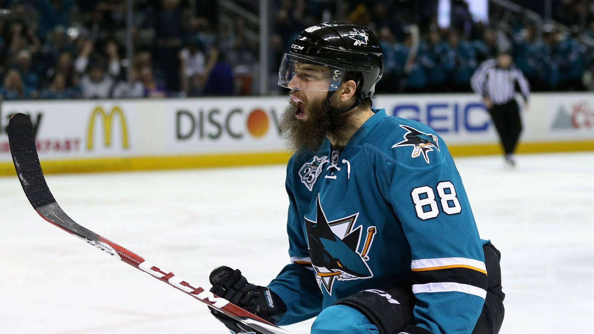 Brent Burns Celebrate Goal Over Dallas Stars Background