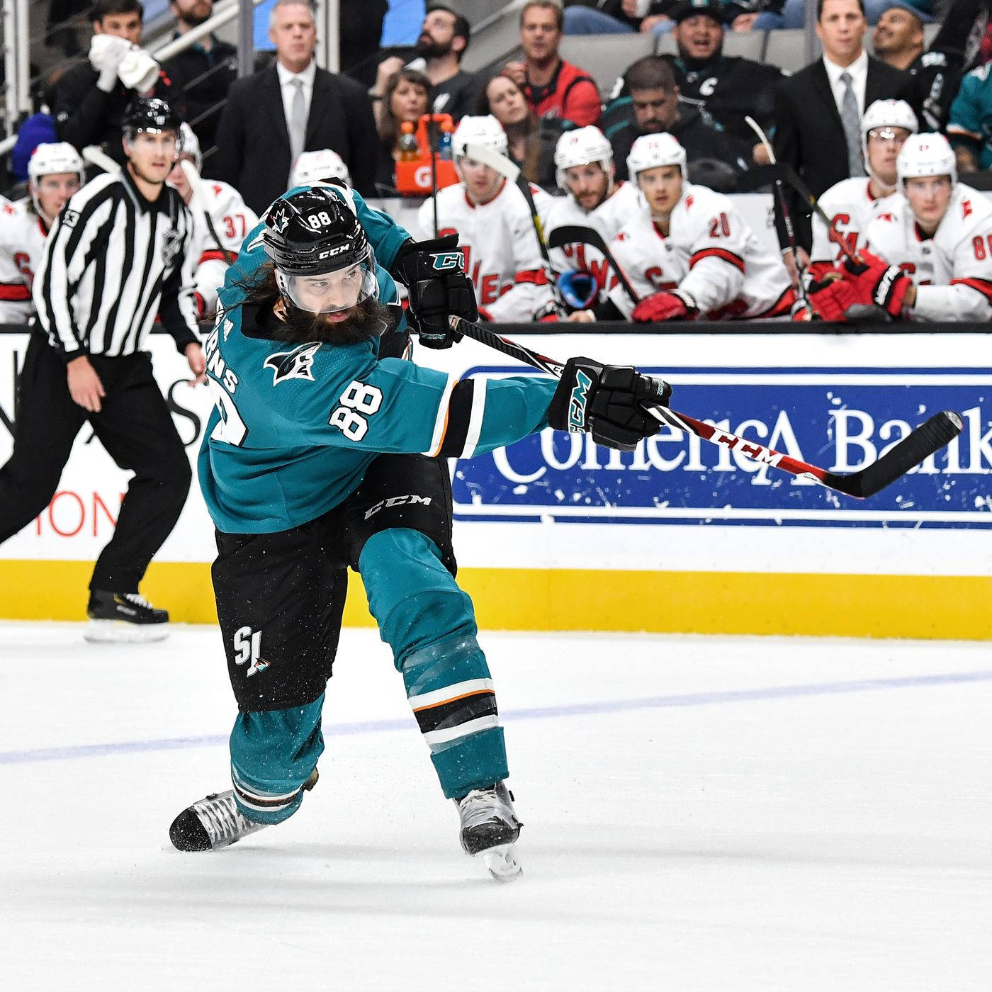 Brent Burns In Action On Ice Background