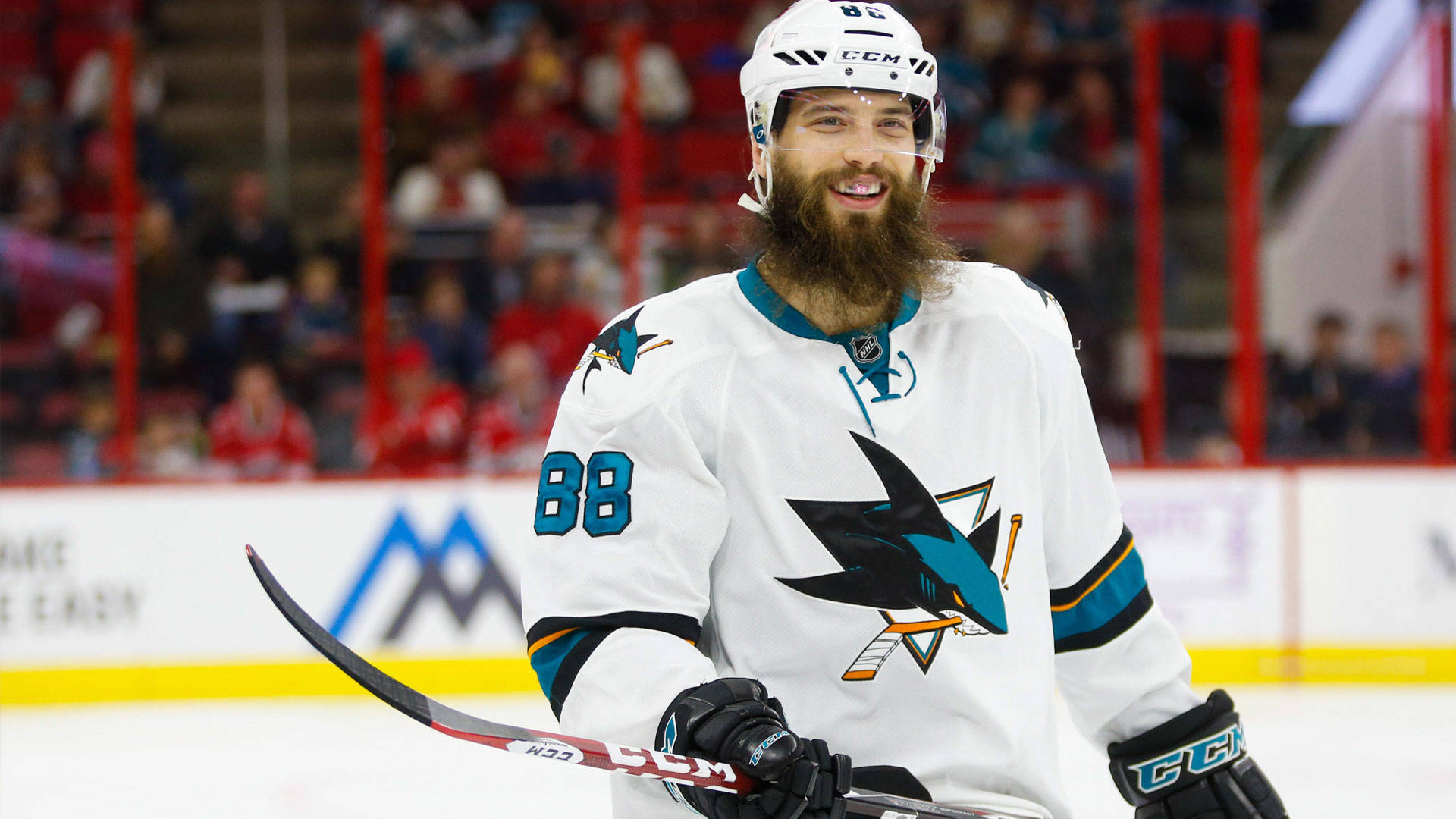 Brent Burns Smiling In His San Jose Sharks Jersey Background