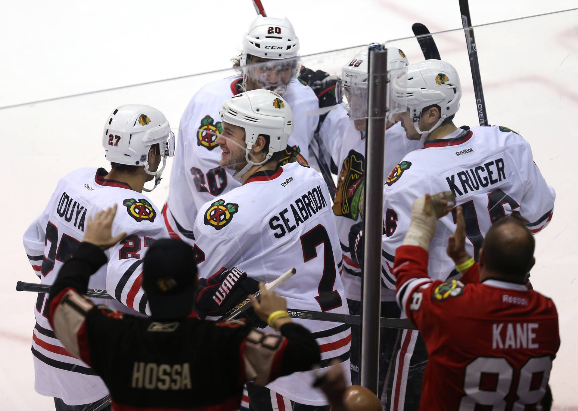 Brent Seabrook Smiling With Teammates Background