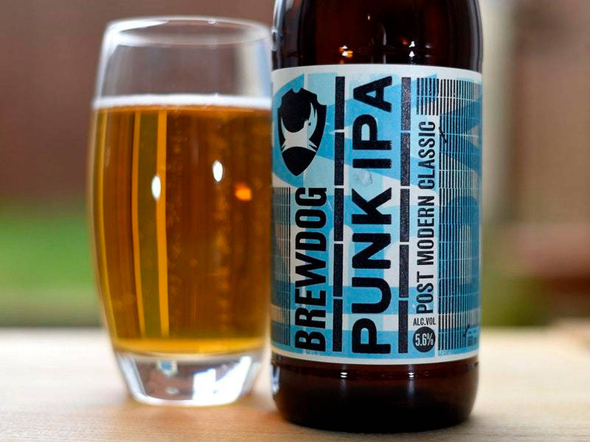 Brewdog Beer Bottle In Glass Background