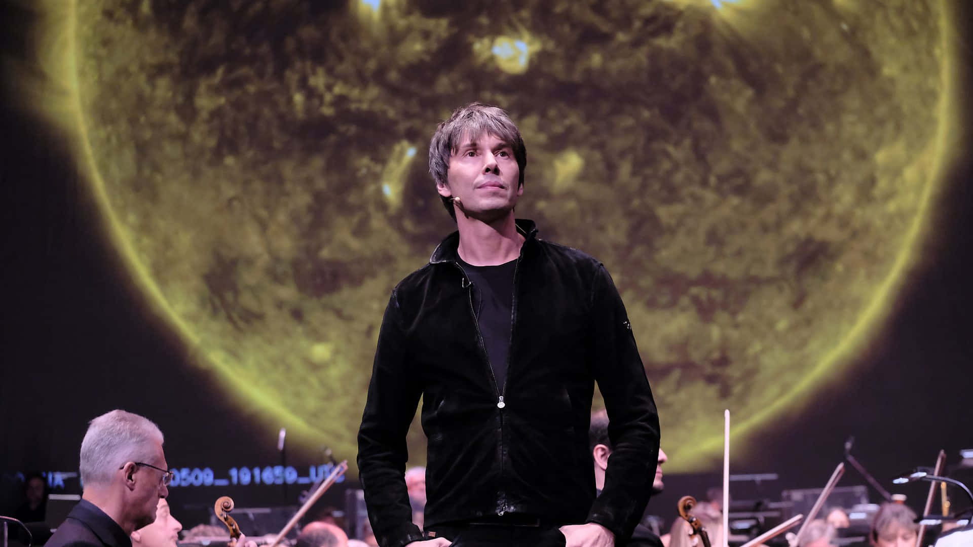 Brian Cox Presenting Cosmic Event Background