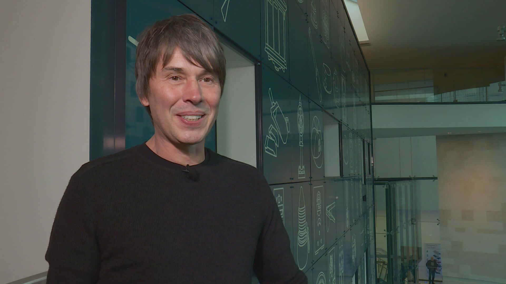Brian Cox Smiling Interview Setting
