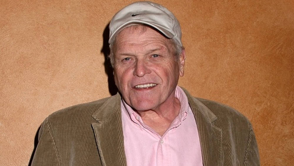 Brian Dennehy Corduroy On Brown Background Background