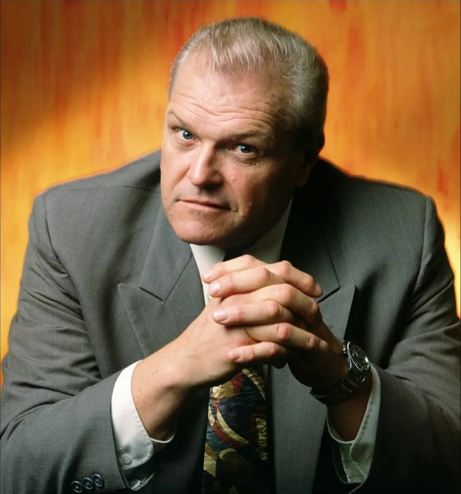 Brian Dennehy Gray Suit Background