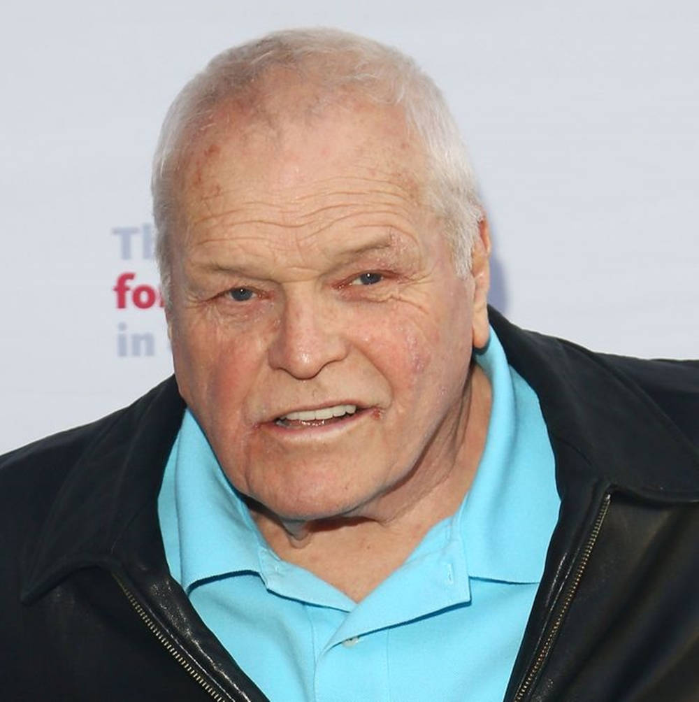 Brian Dennehy In Black And Blue Outfit