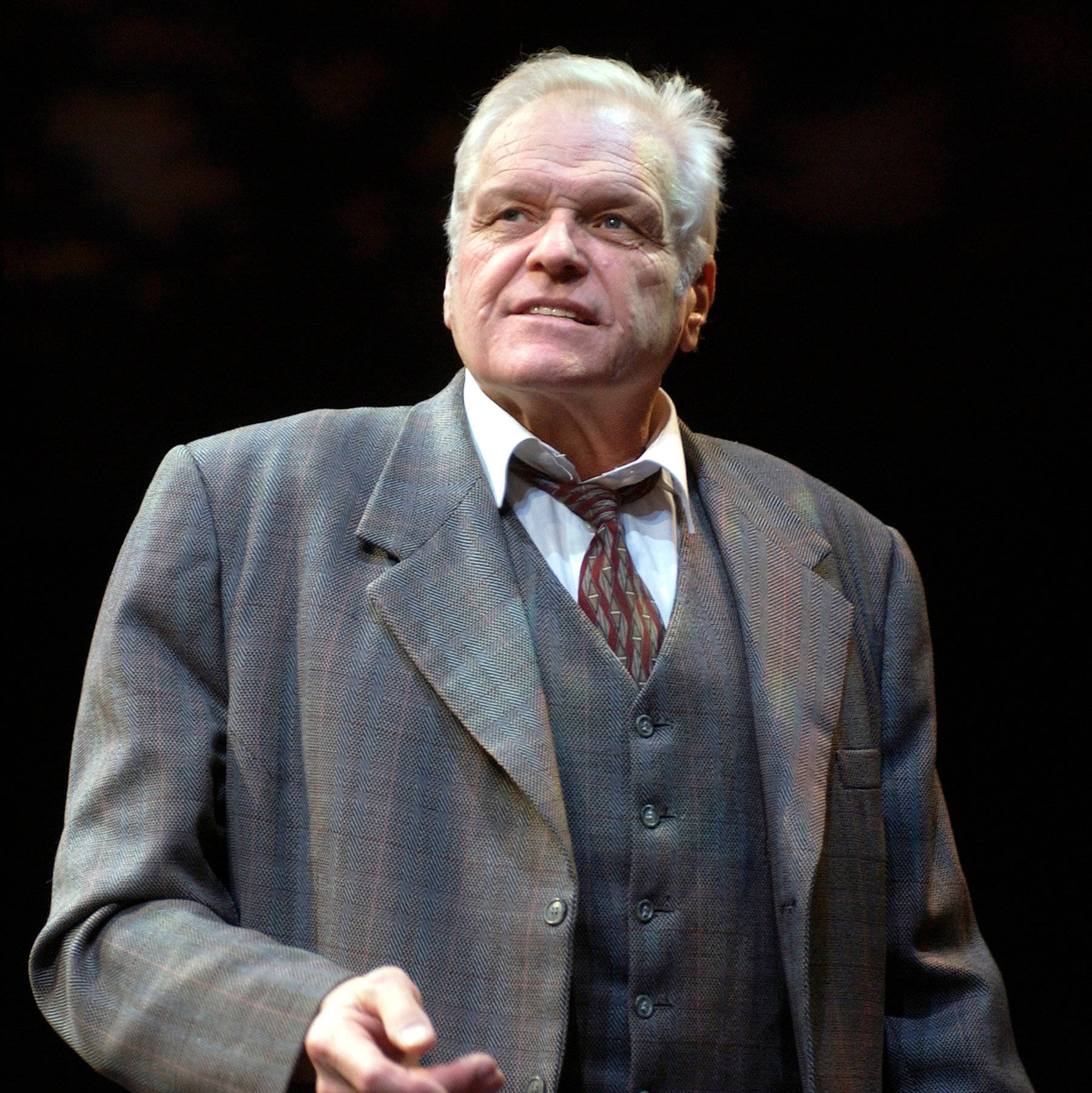 Brian Dennehy Suit And Trenchcoat On Black Background