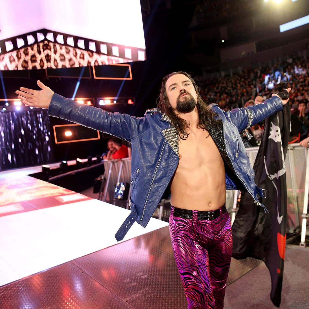 Brian Kendrick In His Signature Purple Trouser Background