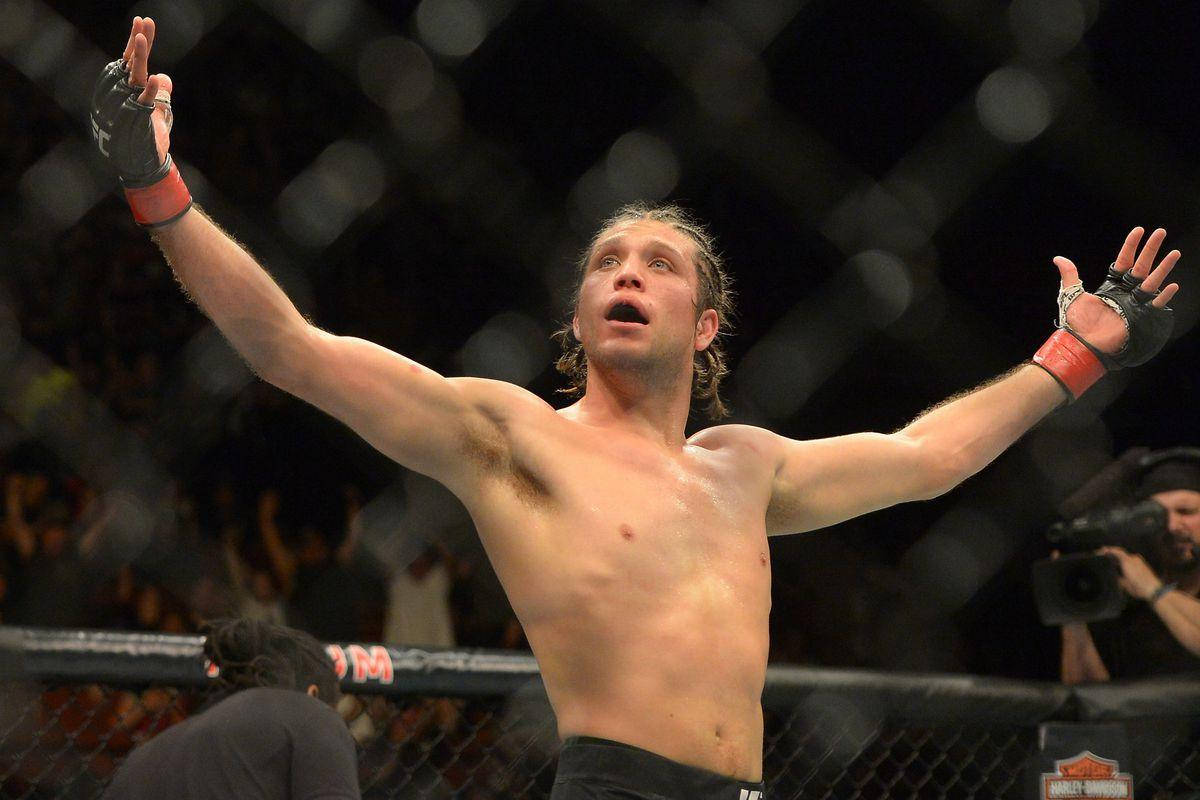 Brian Ortega Arms Outstretched Background