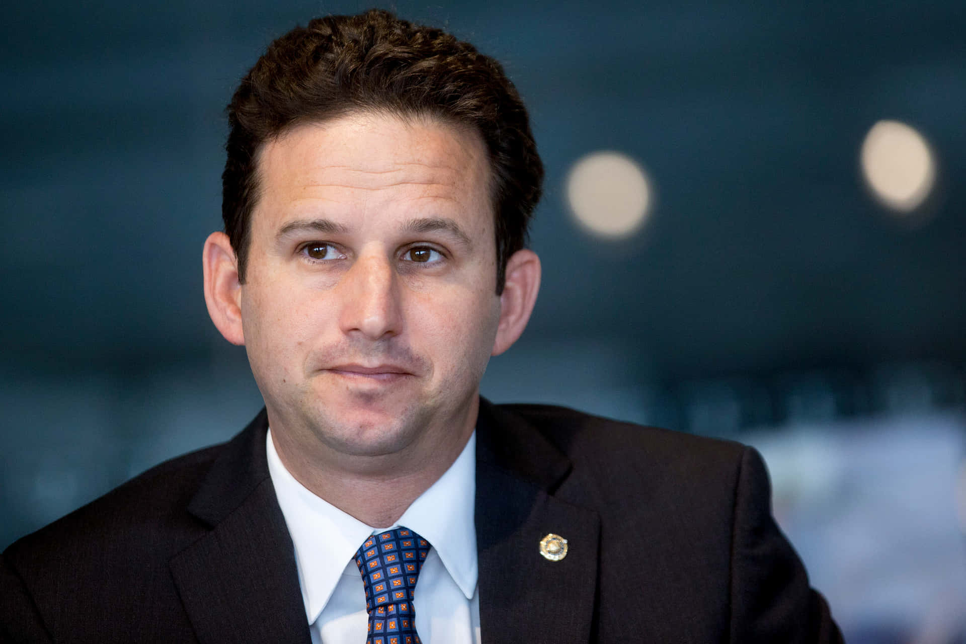 Brian Schatz Slightly Frowning Background