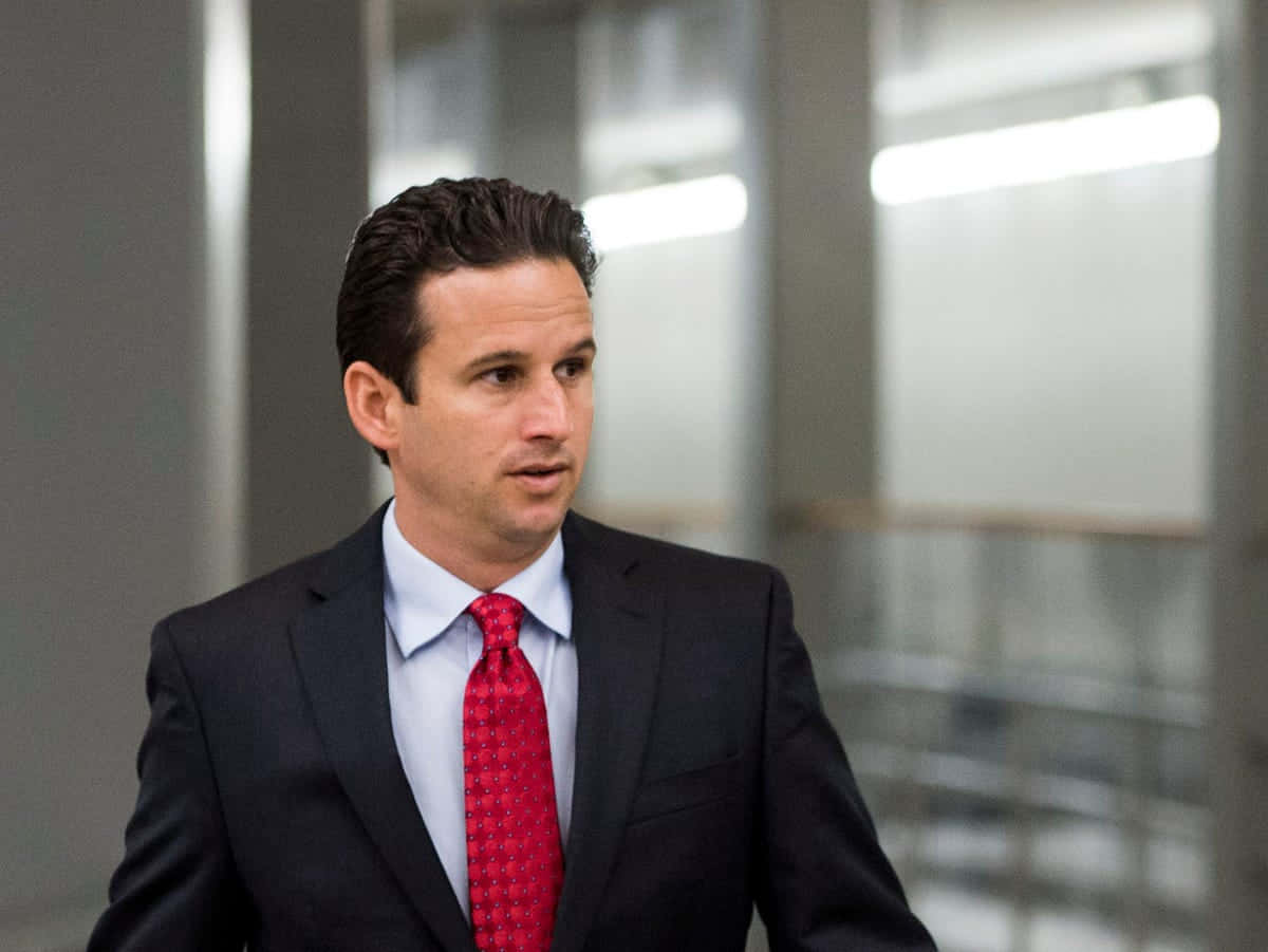Brian Schatz Walking From Subway Background