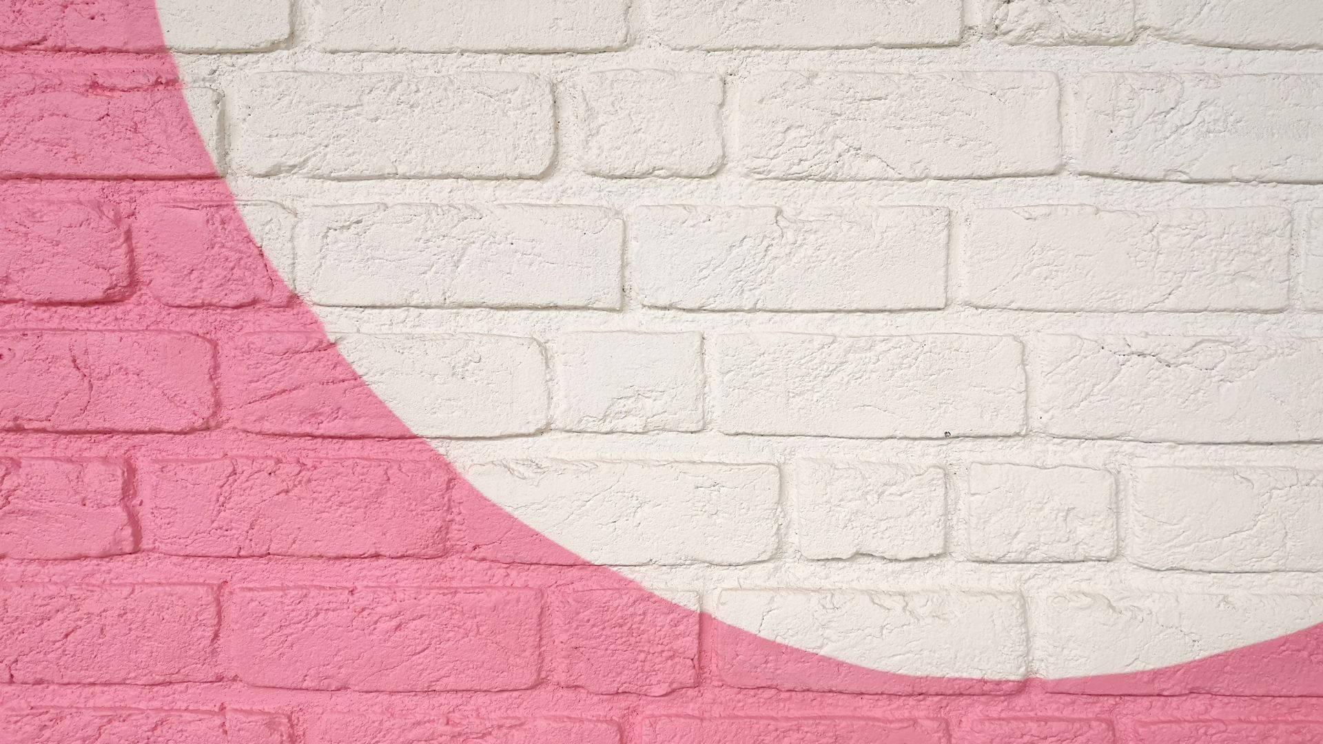Brick Wall With Baby Pink Paint Background