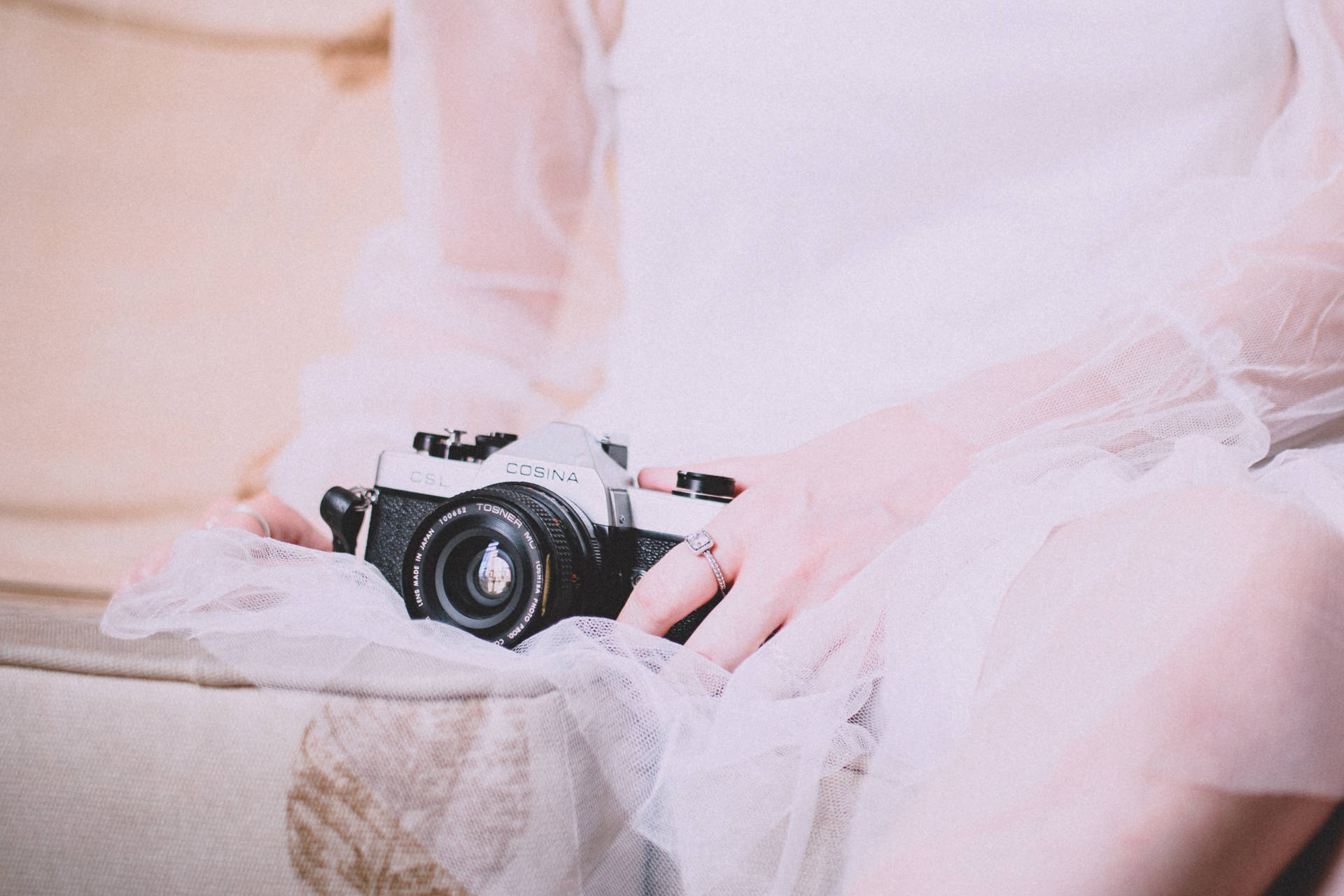 Bridesmaid Capturing Memories With Cosina Camera Background