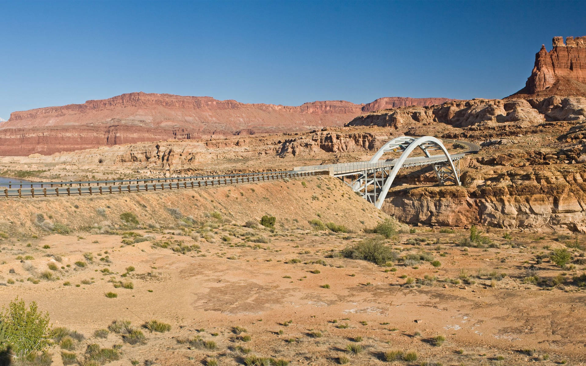 Bridge In Desert Mountains Background
