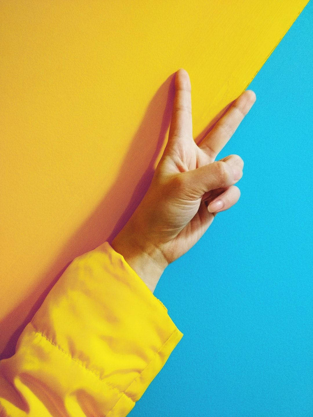 Bright And Colorful Peace Sign In Bold Yellow Background
