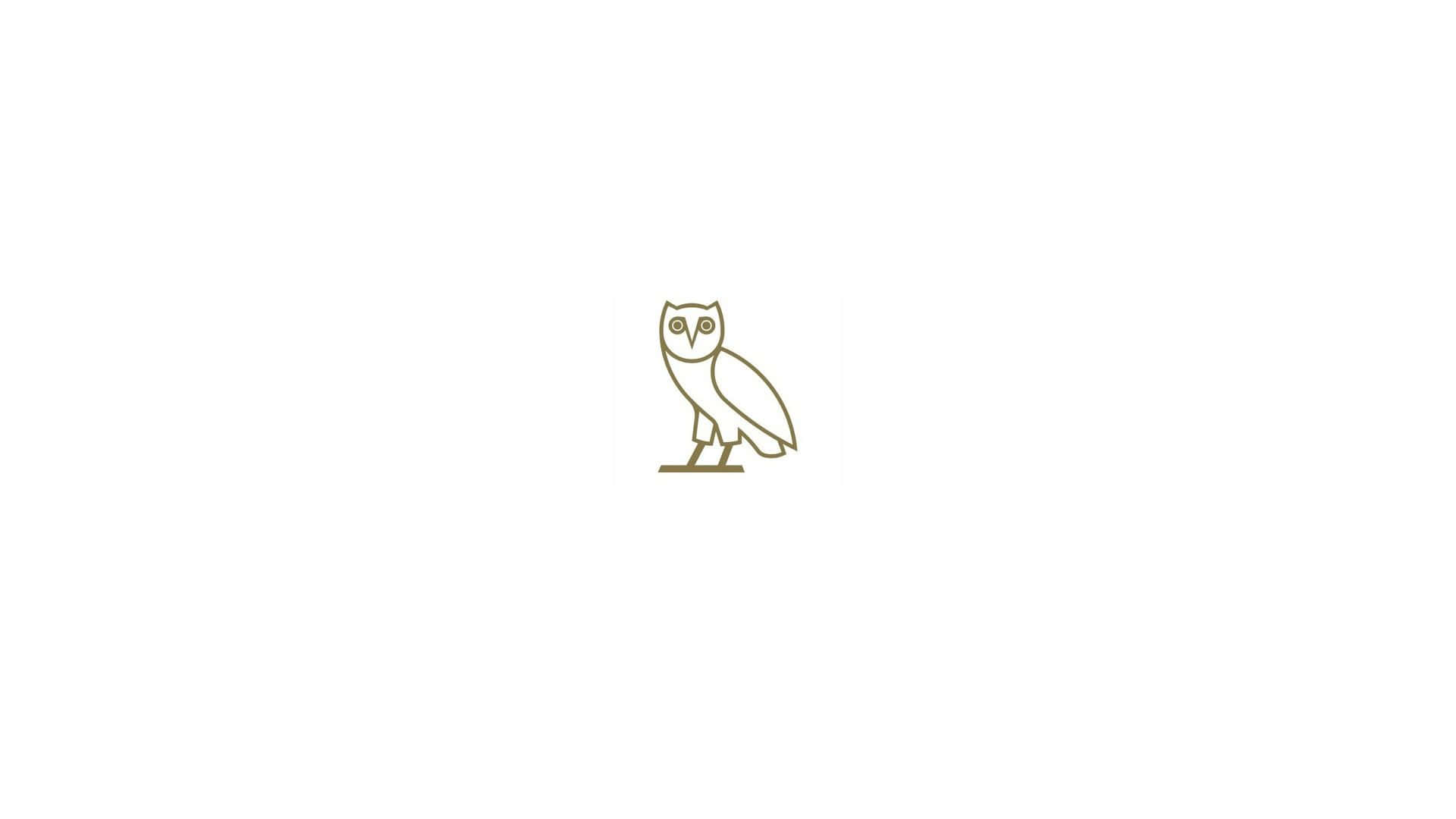 Bright Gold Drake Ovo Owl Logo On Front Of Iphone Background