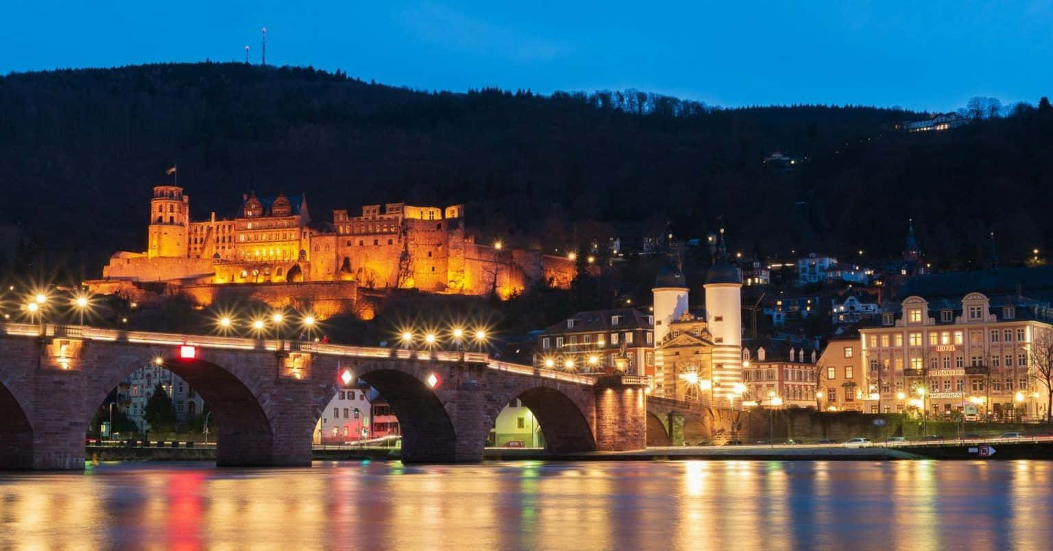 Bright Lights Of Heidelberg Castle Background