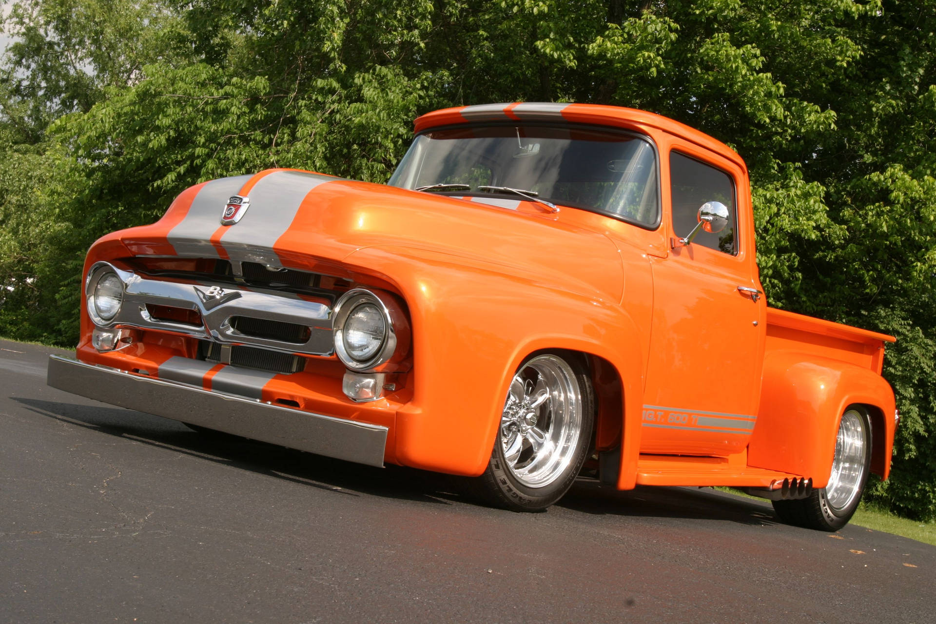 Bright Orange Old Ford Truck Background