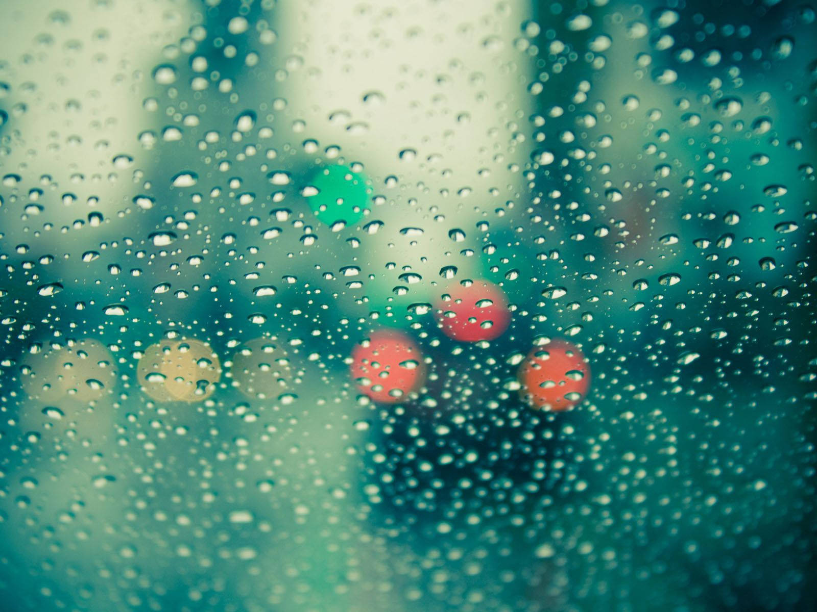 Bright Raindrops On A Car Glass Window