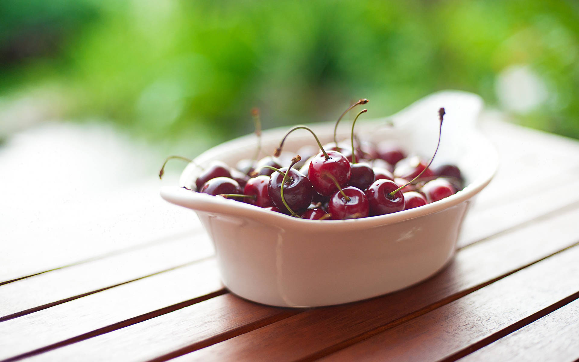 Bright Red Cranberries In A Ceramic Bowl