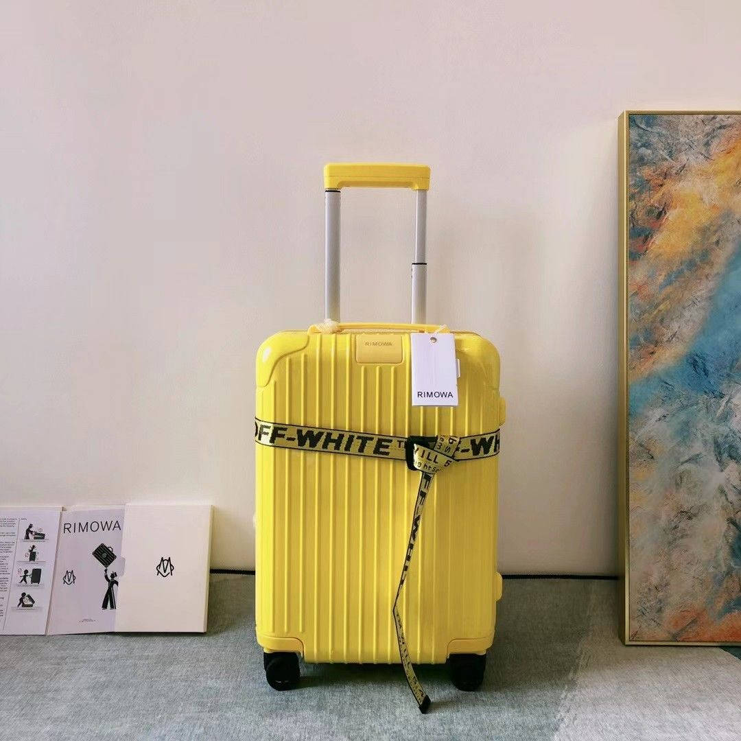 Bright Yellow Rimowa Suitcase