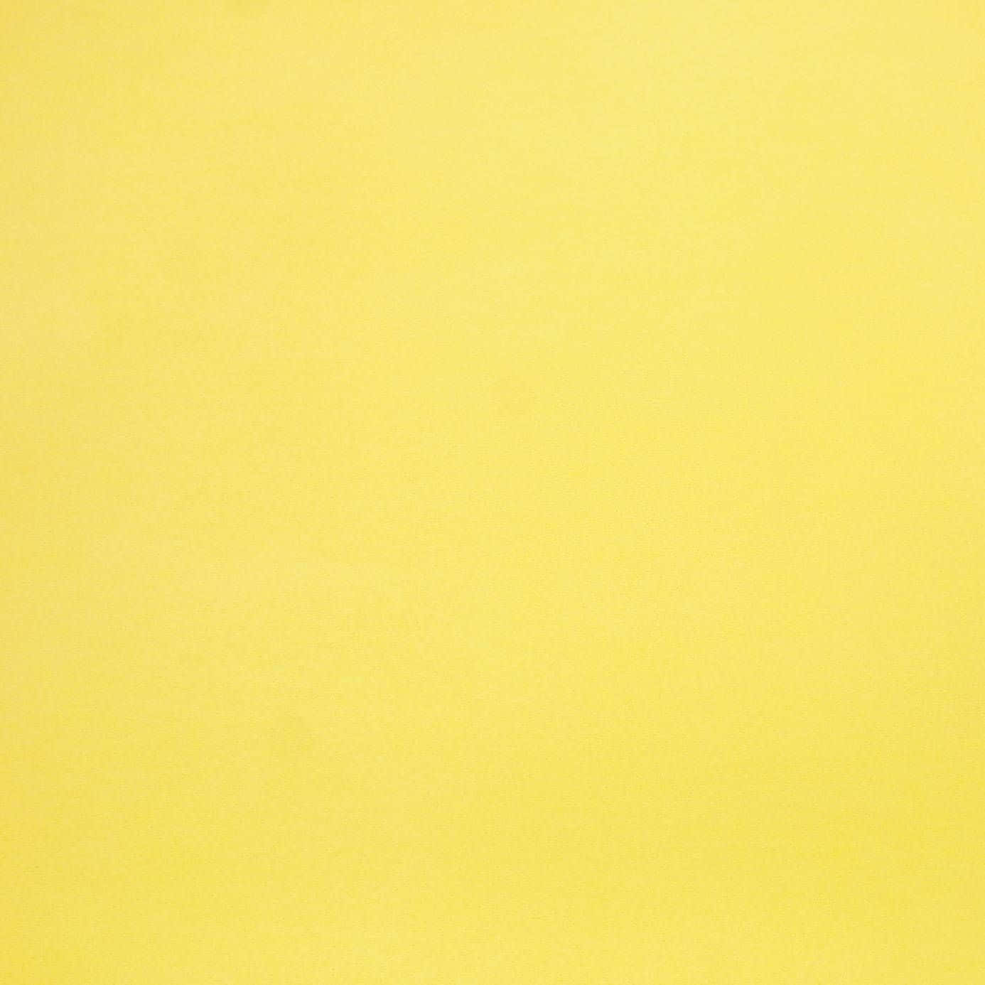 Brighten Your Day With A Vibrant Solid Yellow Background