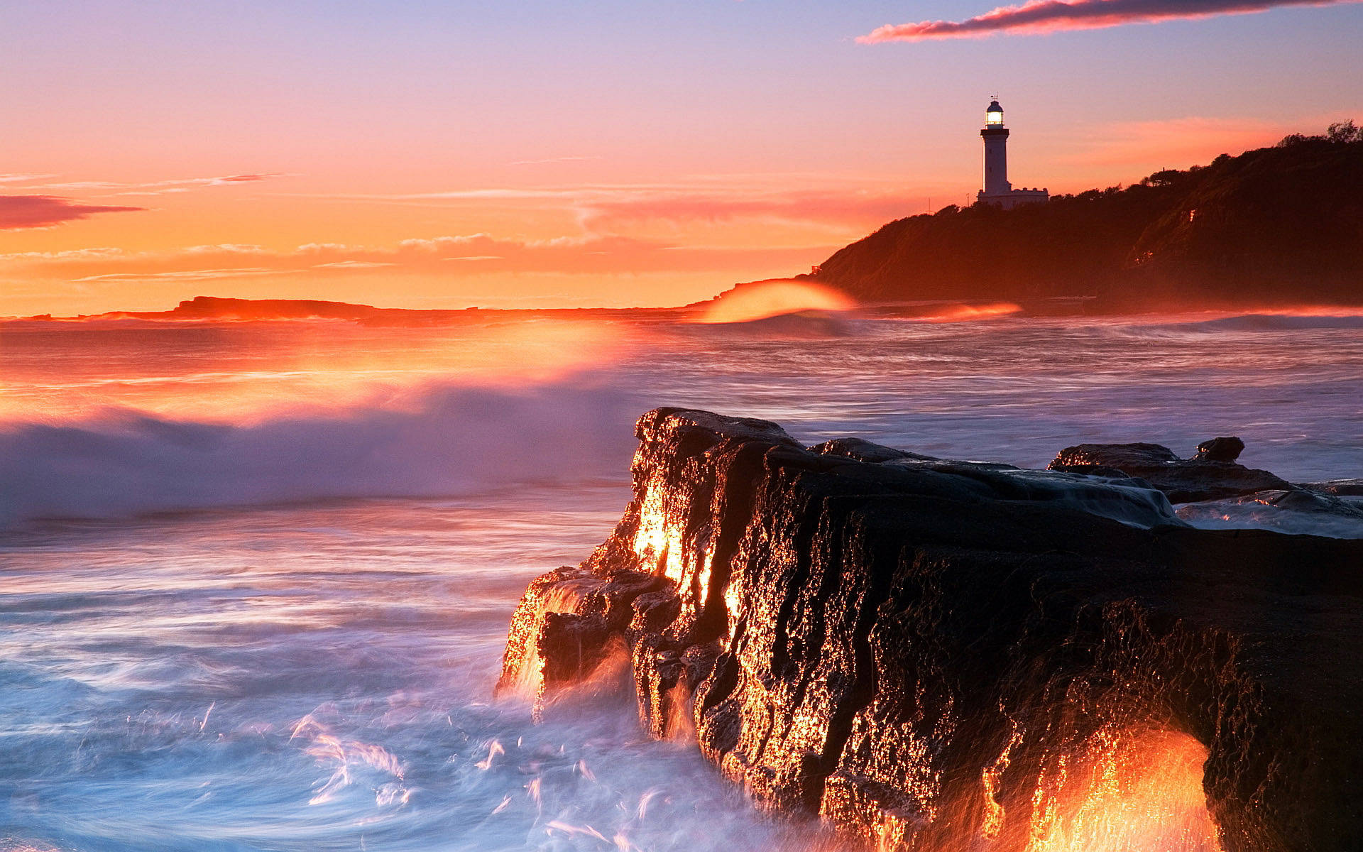 Brilliant Lighthouse Orange Sunset Background