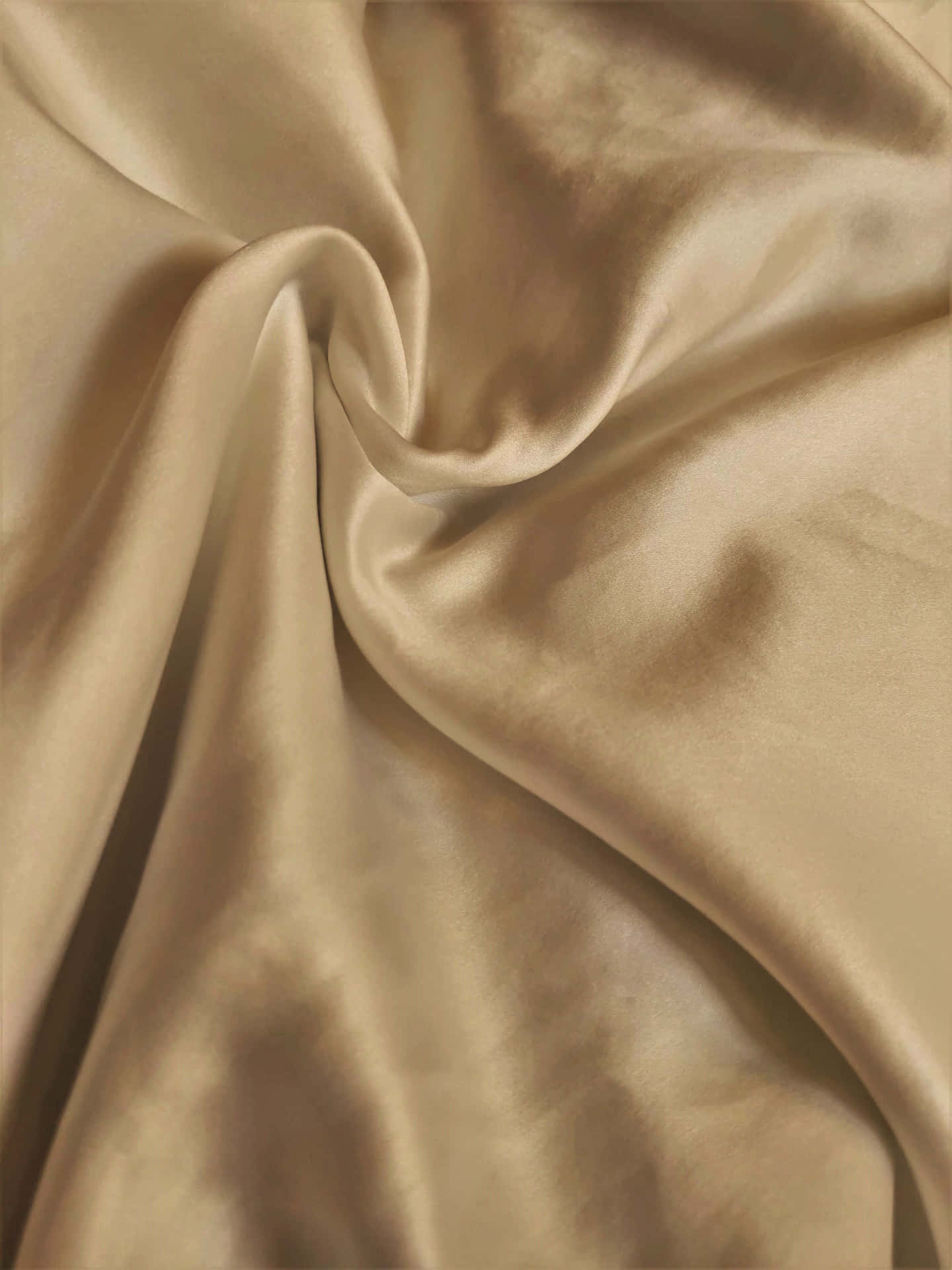 Bring A Touch Of Luxury To Your Home With This Golden Silk Wallpaper. Background