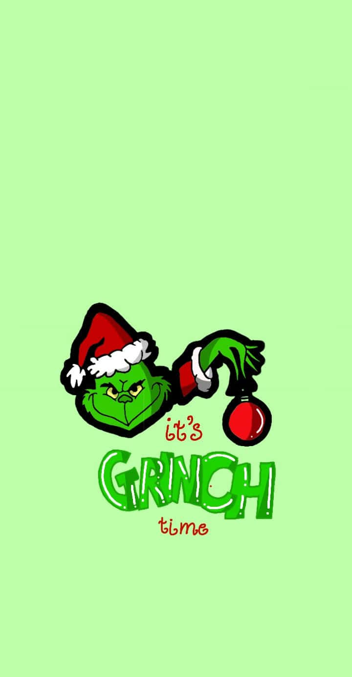 Bring On The Christmas Cheer With A Cute Grinch Background