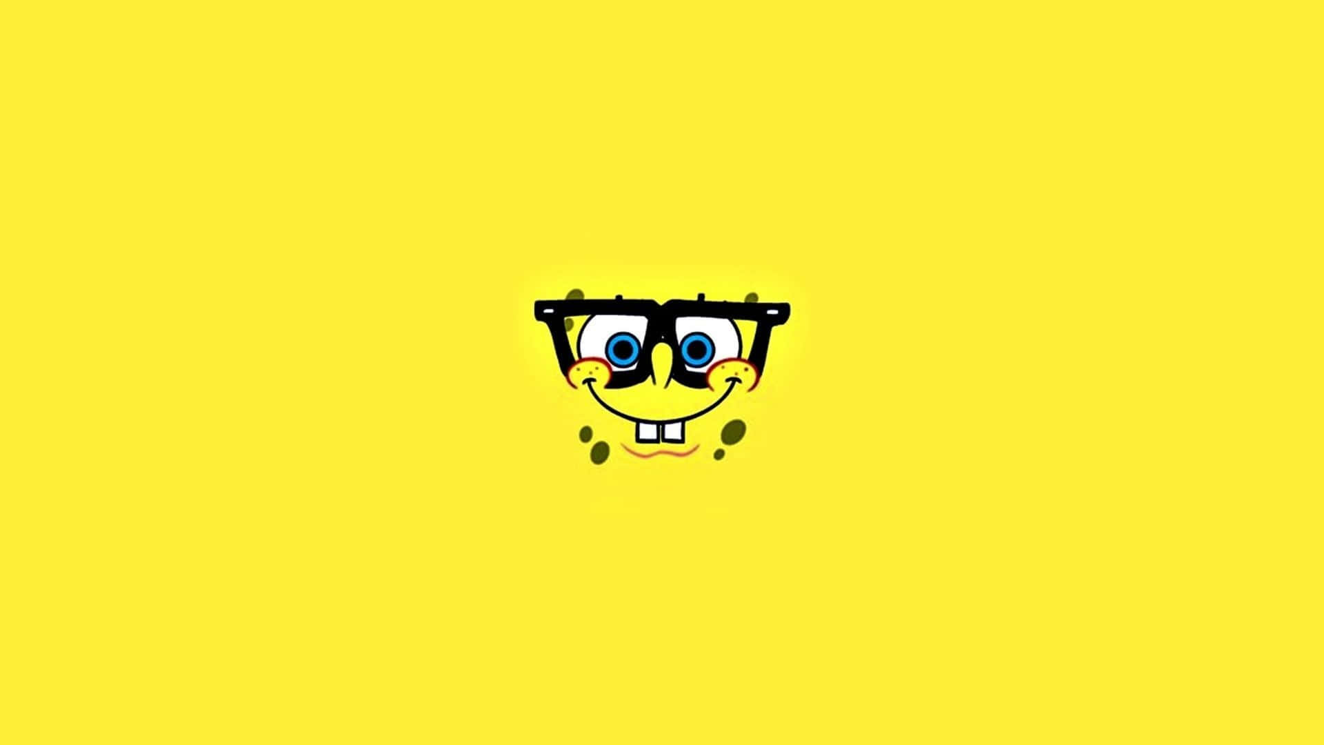Bring Some Fun To Your Day With This Cheerful Spongebob Face Wallpaper! Background